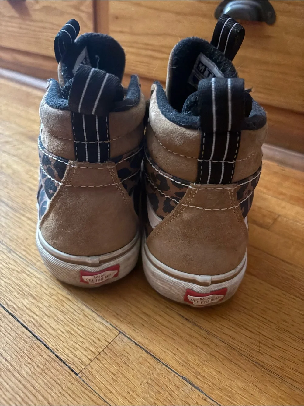 Vans Women's High-Top Winter Boots in Brown and White or a men’s 9.5